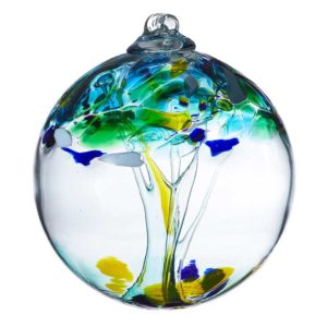 During Best of Stowe 2021, you can purchase a specially priced "Stronger Together" commemorative hand blown glass ball, like the one pictured with swirls of blues, greens and yellows