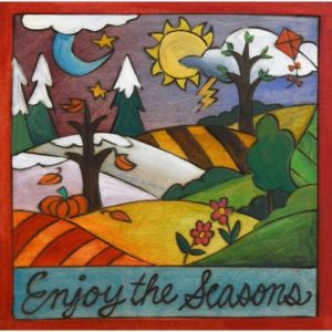 four colorful seasons printed on a wooden plaque